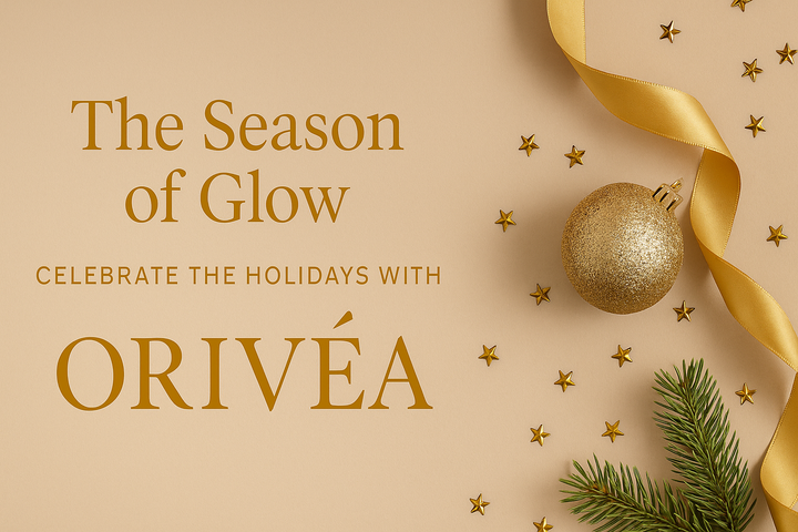 Elegant holiday banner for ORIVÉA featuring beige and gold tones, soft festive lights, and refined typography reading ‘The Season of Glow – Celebrate the Holidays with ORIVÉA’, reflecting luxury, clean beauty, and minimalist sophistication.